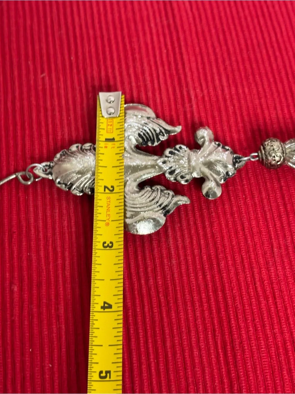 Metal Fleur-de-Lis Hanging Ornament with Silver tone Tassel